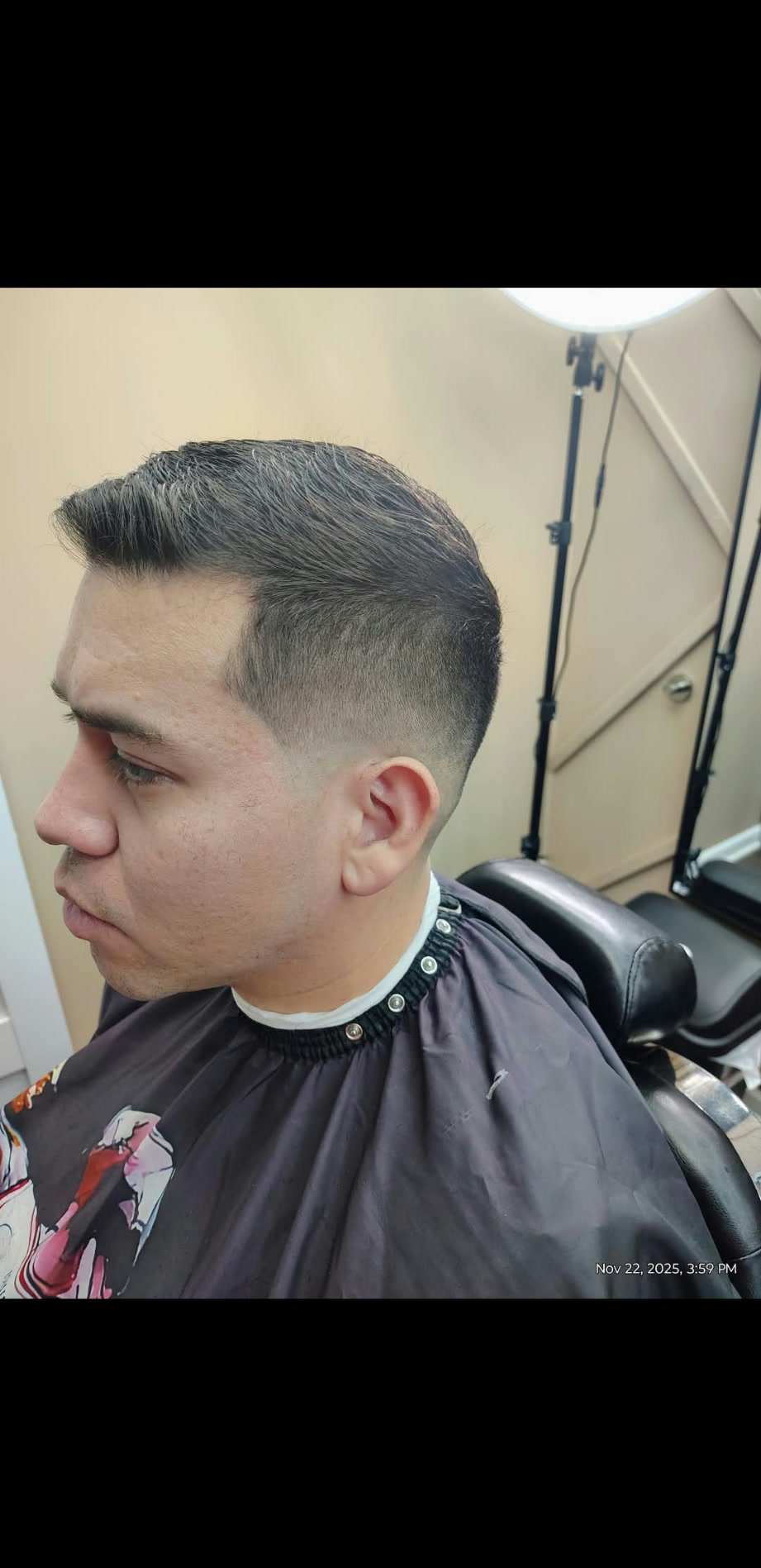 Chad — clean side part fade