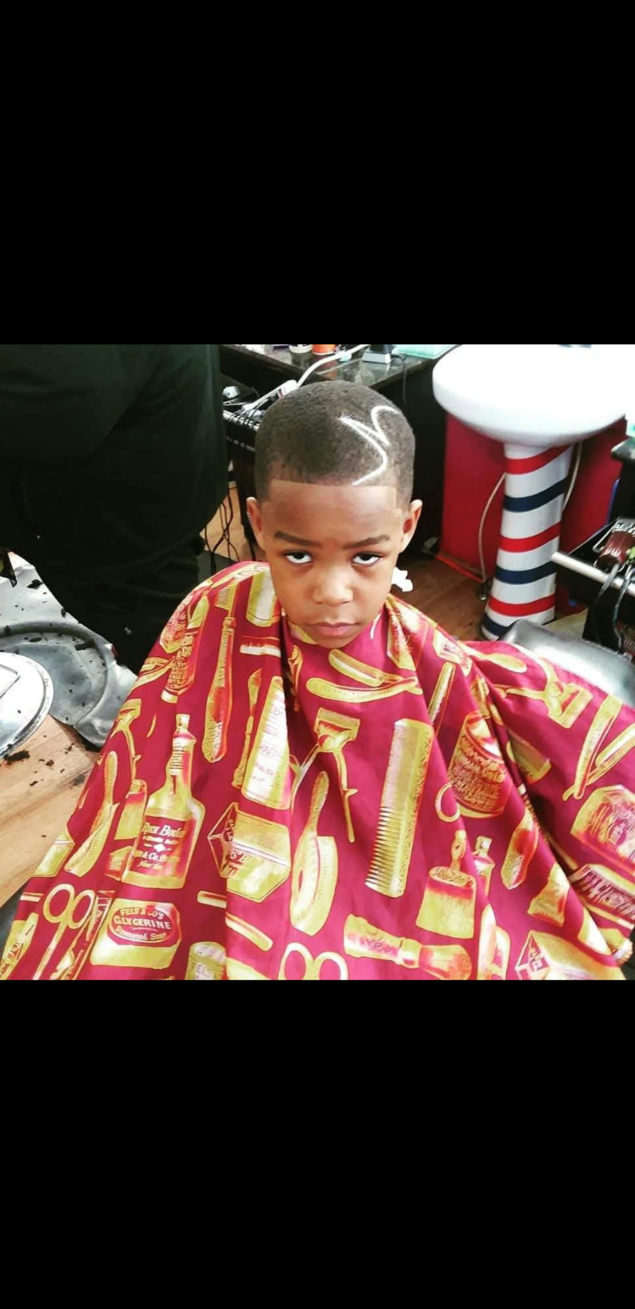 Chad — kid's braids with part