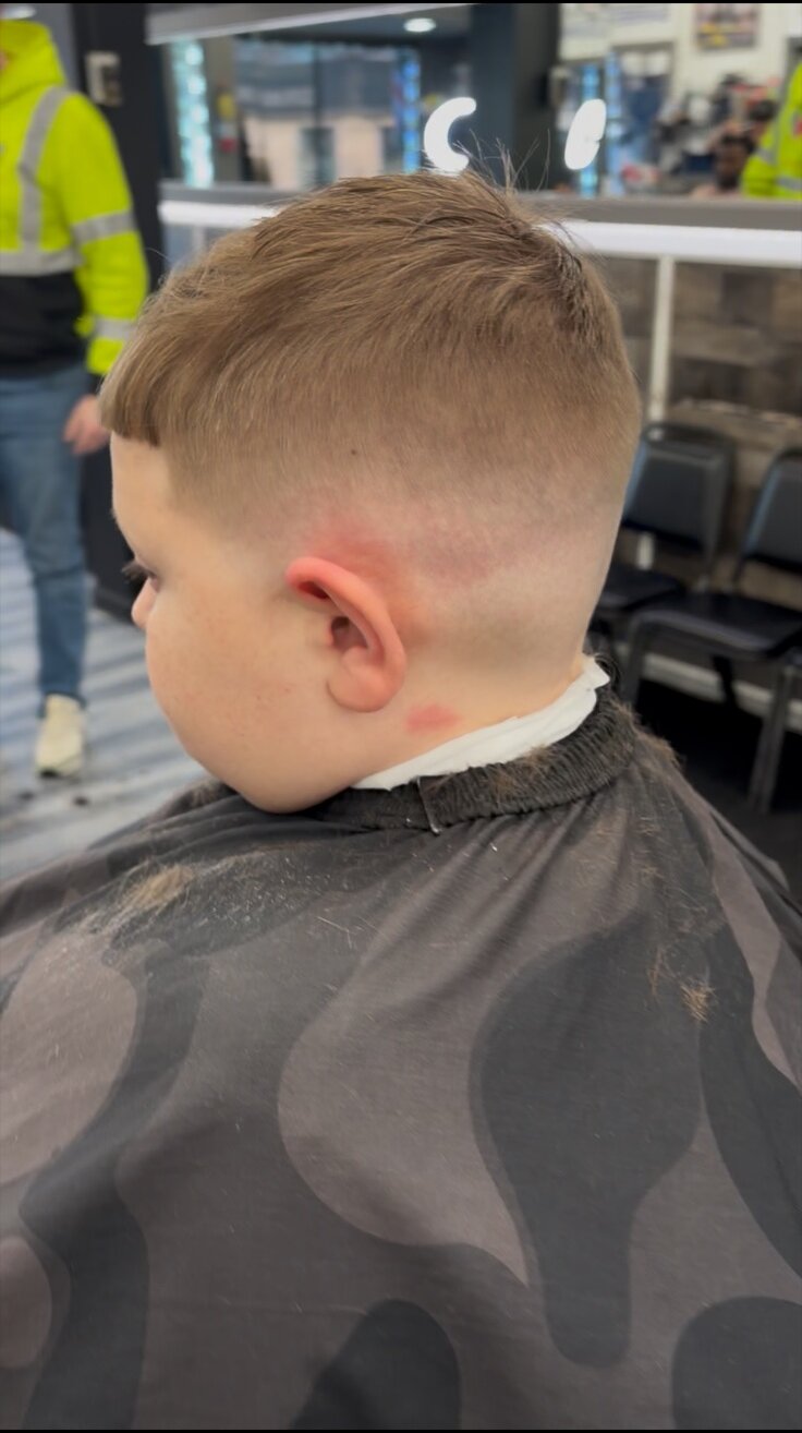 Eligio Roman — kid's comb over with clean fade