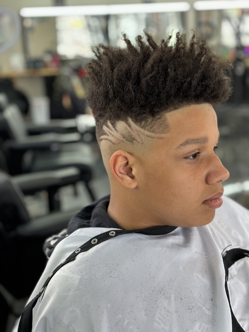 Kris — high top fade with razor design