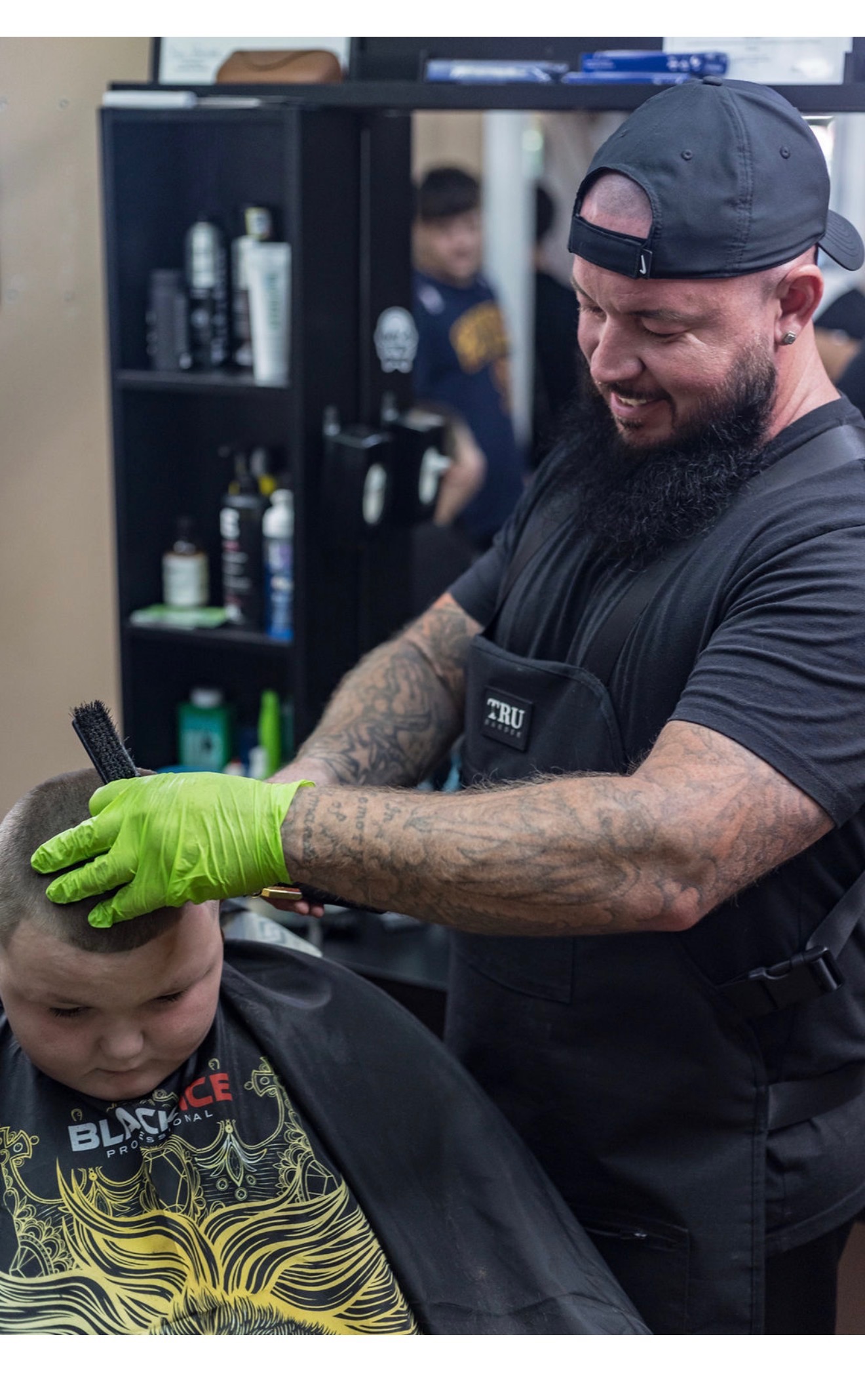 Joe working with a child client, showing patience and skill