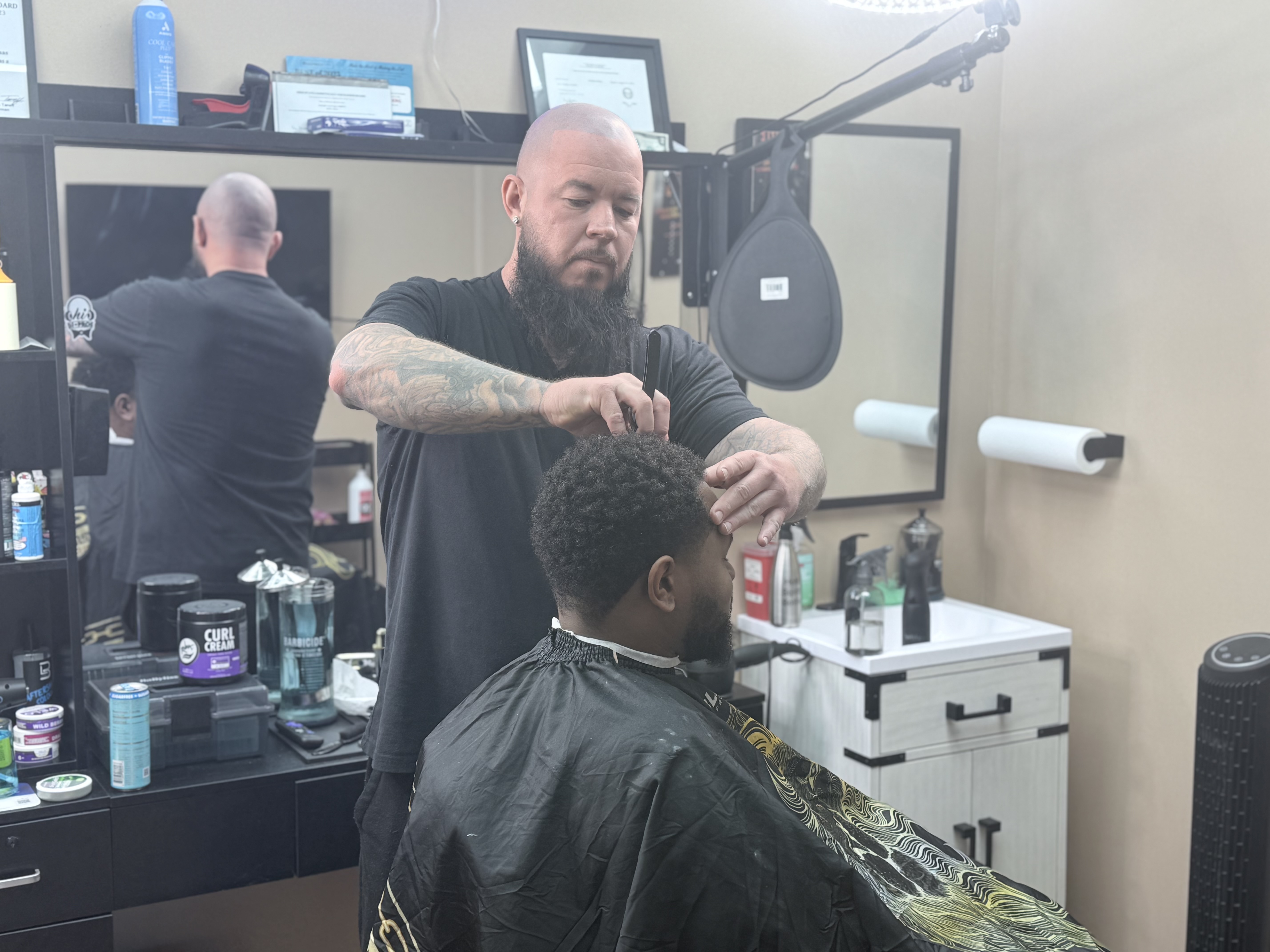 Joe working on a client at Joe's Barber Studio